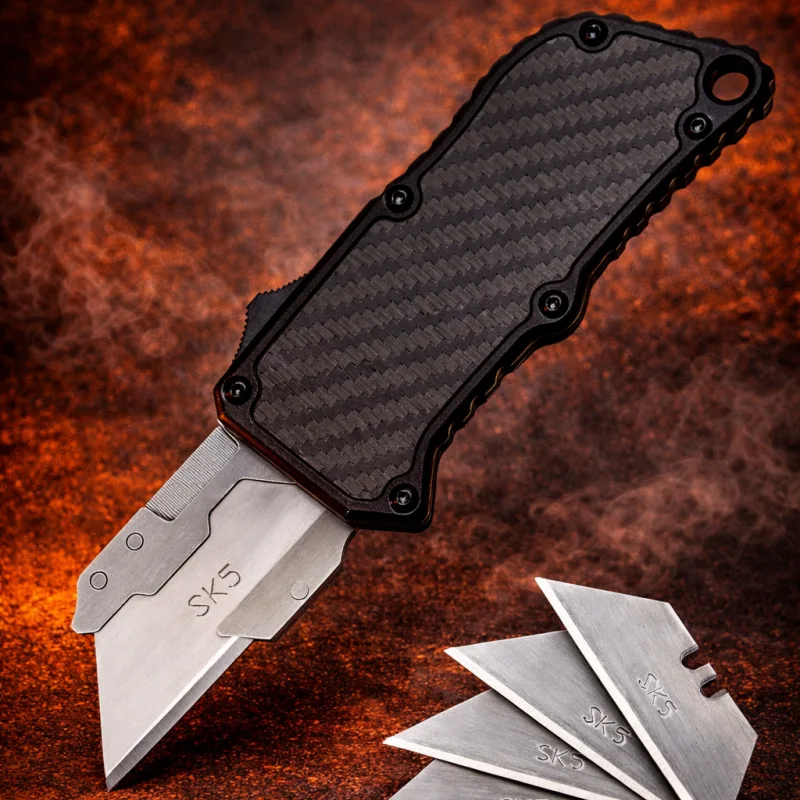 otf-box-cutter-dual-action-utility-knife-black.jpg otf box cutter dual action utility knife black handle studio photo