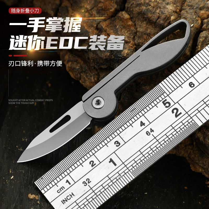 01-01cae01c0cc6.webp Titanium alloy Camping Outdoor Knife Retail Display for Wholesale
