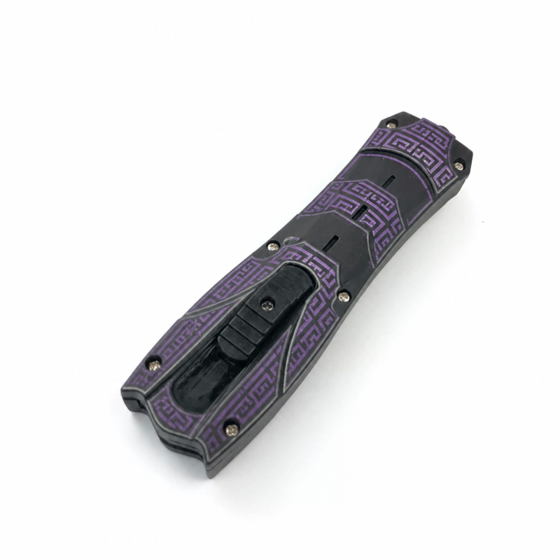 Graphite Orchid Meander Key sculpted-handle OTF automatic knife shown closed on white