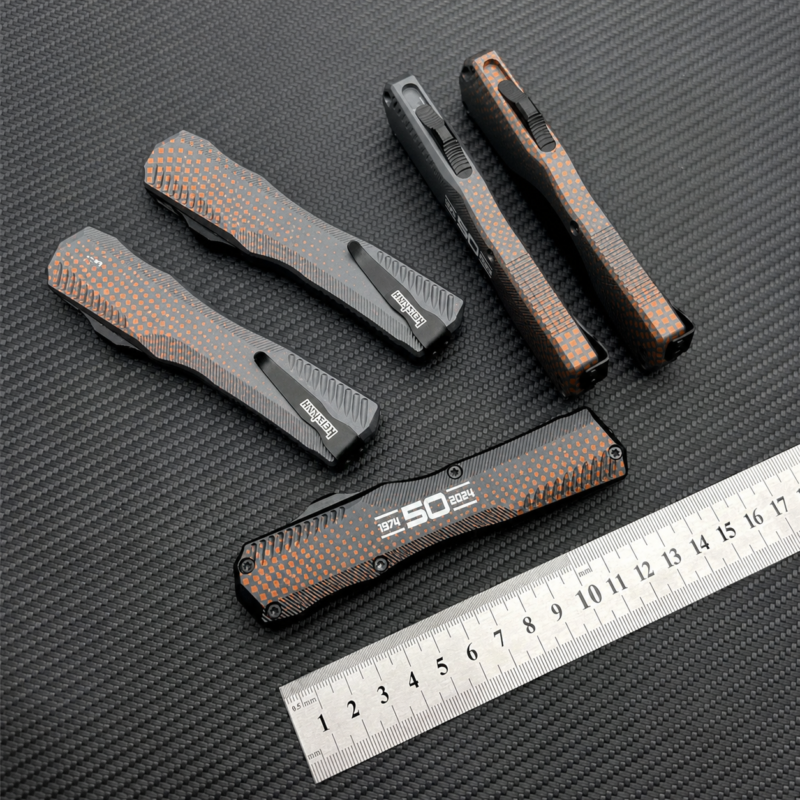 Storm Gray Tangerine Micro Checker compact OTF automatic knife with tapered housing and linear slider
