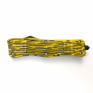Lemon Charcoal Kinetic Bars waisted-handle OTF automatic knife shown closed on white