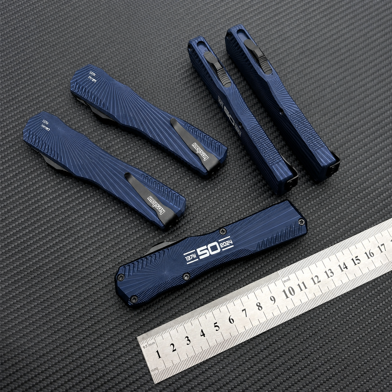 Navy Pearl Fan Fold Pleats Compact OTF Automatic Knife Navy Pearl Fan Fold Pleats compact OTF automatic knife with tapered housing and linear slider