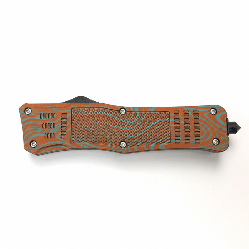 Rust Orange Cyan Linocut Currents waisted-handle OTF automatic knife shown closed on white