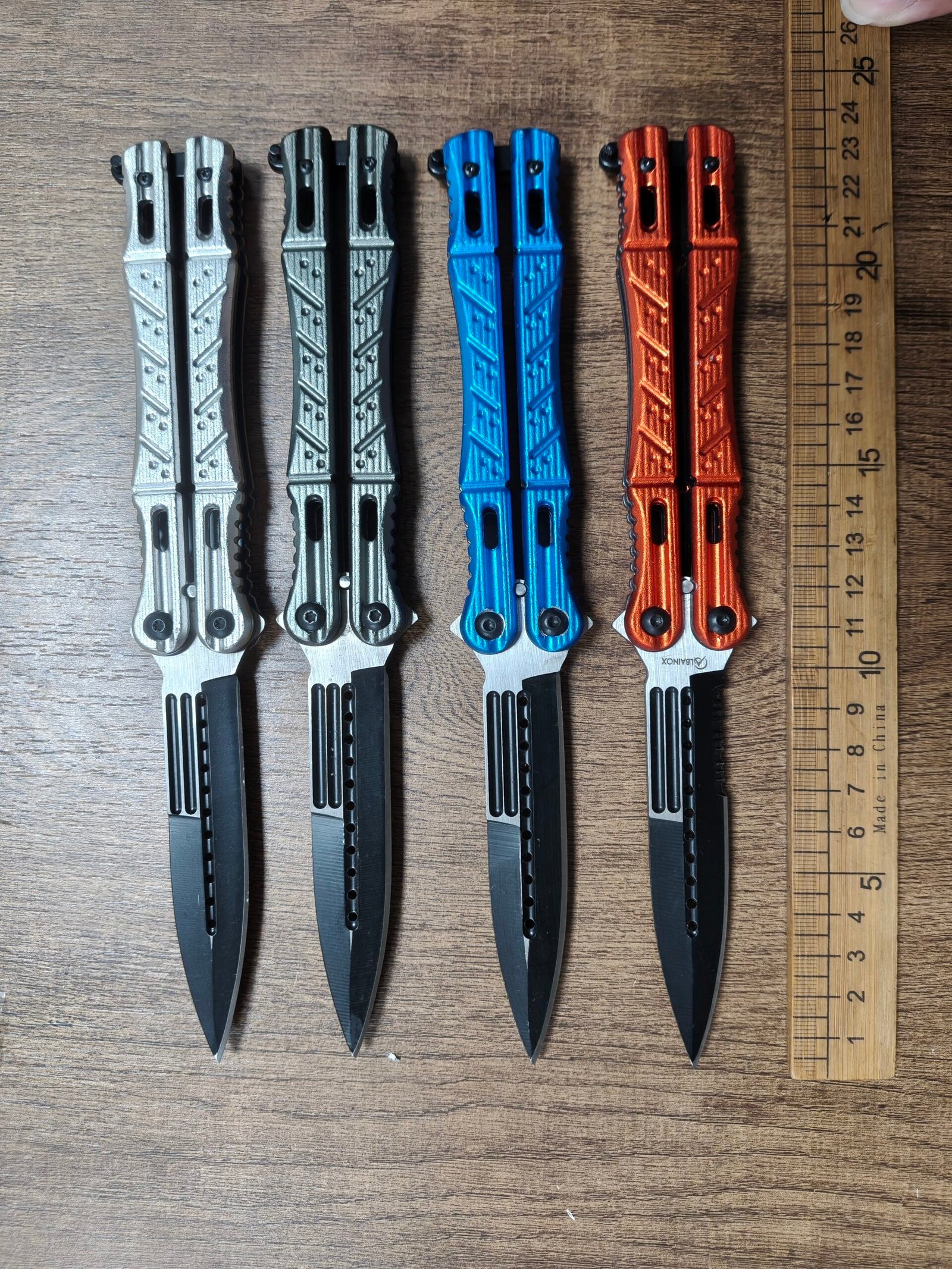 textured-handle-colors Textured relief handle butterfly knife in five color options