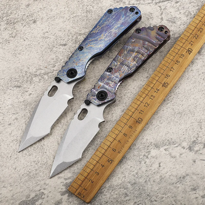 CNC Newly Designed EDC Pocket Knife in 2026 D2 Steel-fired Patterned Colored Titanium Alloy Come with a Safety Lock Two Color - product view 2
