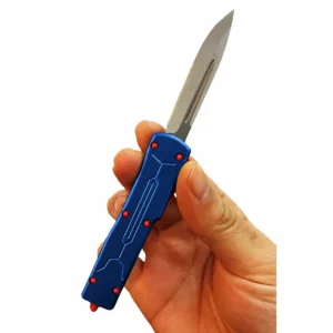 Deep navy micro-dot mini OTF knife with satin drop-point blade and six red handle fasteners