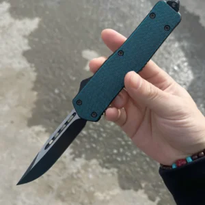OTF-Messer Micro-Hex in Mitternachts-Petrol mit schwarzer Drop-Point-Klinge und fünf schwarzen Griffschrauben