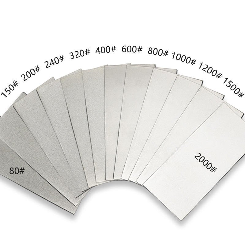 Thin rectangular diamond sharpening plates with continuous abrasive faces and different grit labels