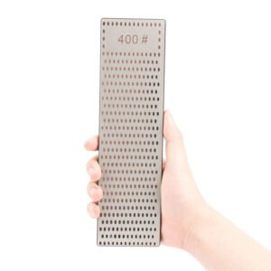 Long rectangular diamond sharpening block with oval-patterned abrasive face marked400