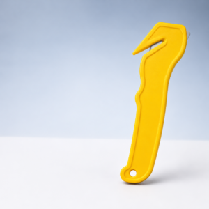 Angled-Slot Strap and Film Cutter