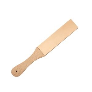 Wooden handled paddle with a flat leather stropping surface and hanging hole