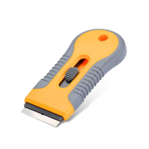 Yellow and gray retractable razor scraper with central thumb slider and ribbed handle